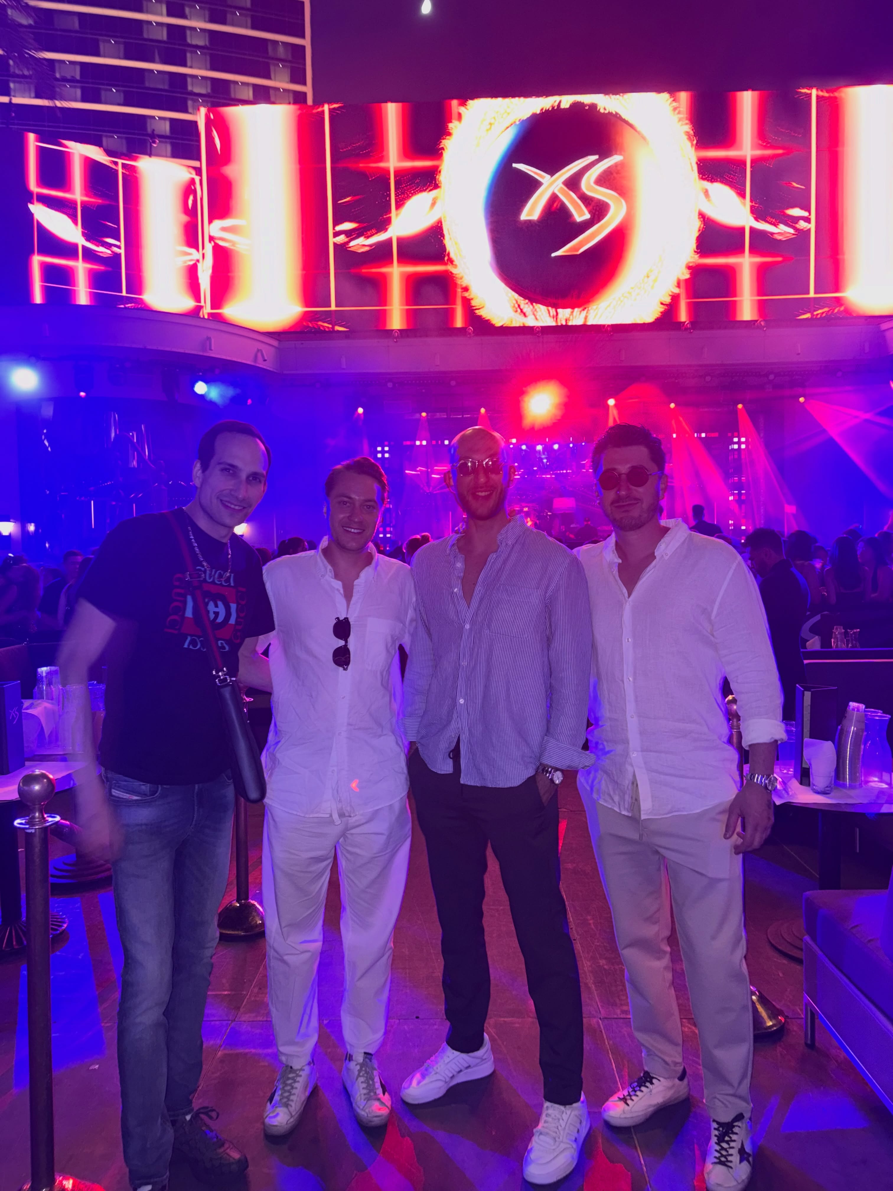 Bryan Zagury with a group of guests on the floor at XS Nightclub